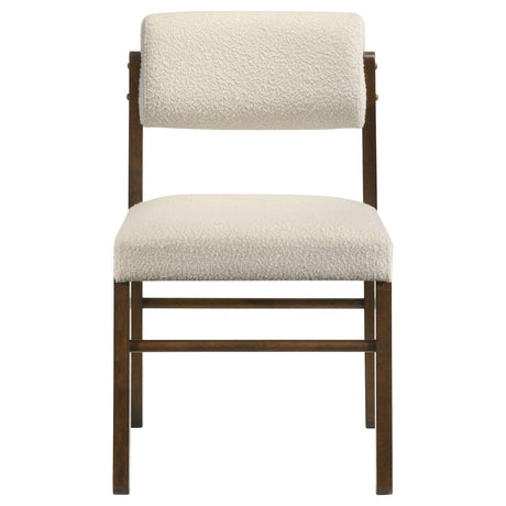 Side profile of armless upholstered dining chair