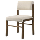 Detail of cushioned seat and upholstered back
