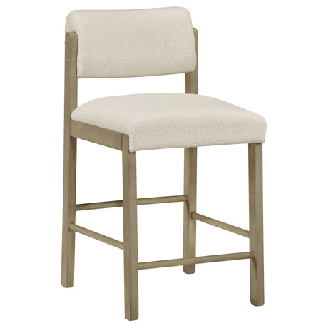 Kehoe upholstered counter height chair side view showing cushioned seat and back