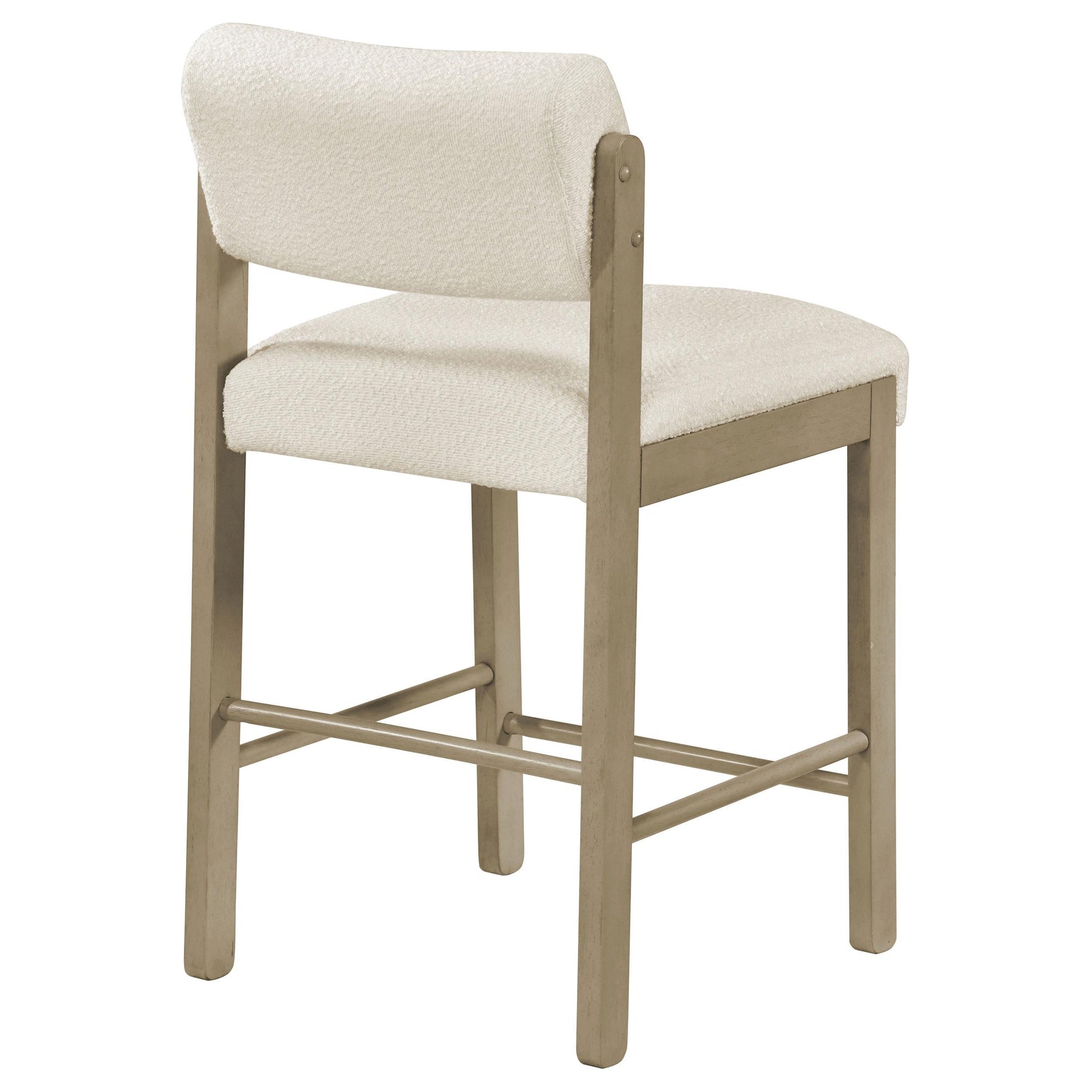 Angled view of Kehoe upholstered counter height chair showing armless silhouette