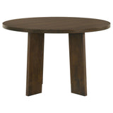 Side view showing round tabletop and pedestal base design