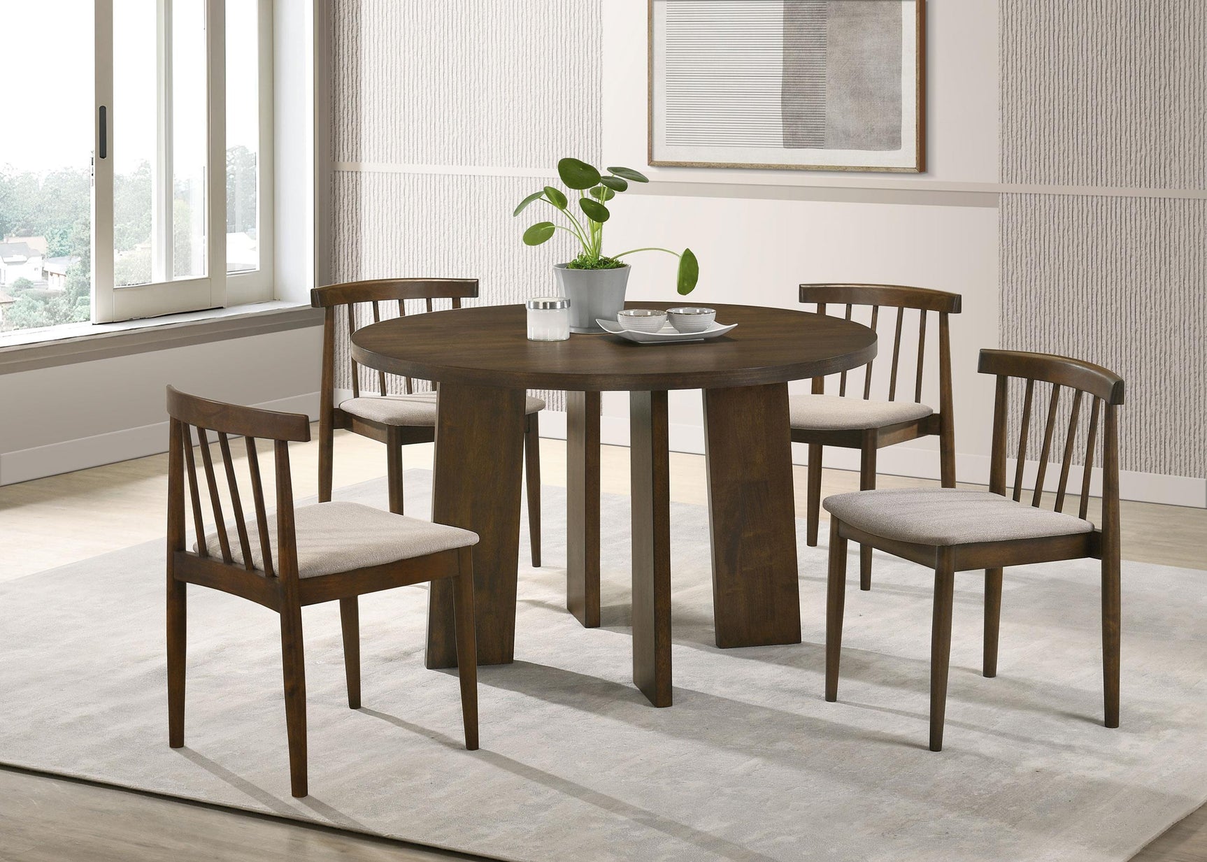 Table set with chairs in dining room setting