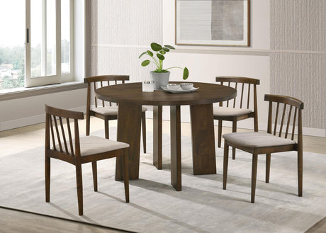 Table set with chairs in dining room setting