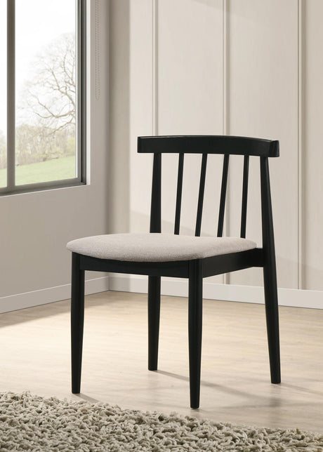 Side angle view of Cullen dining chair showing spindle back and tapered legs