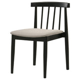Detail of tapered black rubberwood legs on side chair