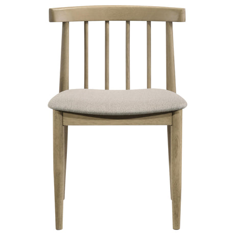 Back view of Cullen dining side chair emphasizing arched top rail and spindles