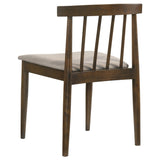 Close-up of arched top rail and chair back with spindles