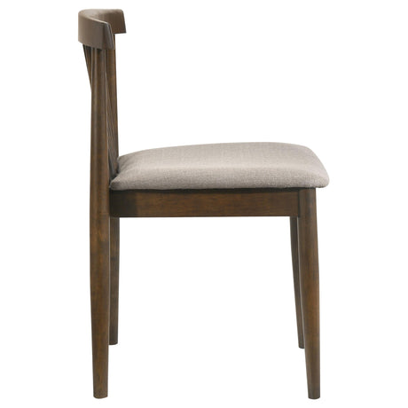 Side view isolating curved armrest-free profile