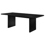 Decker dining table from side highlighting bold panel legs