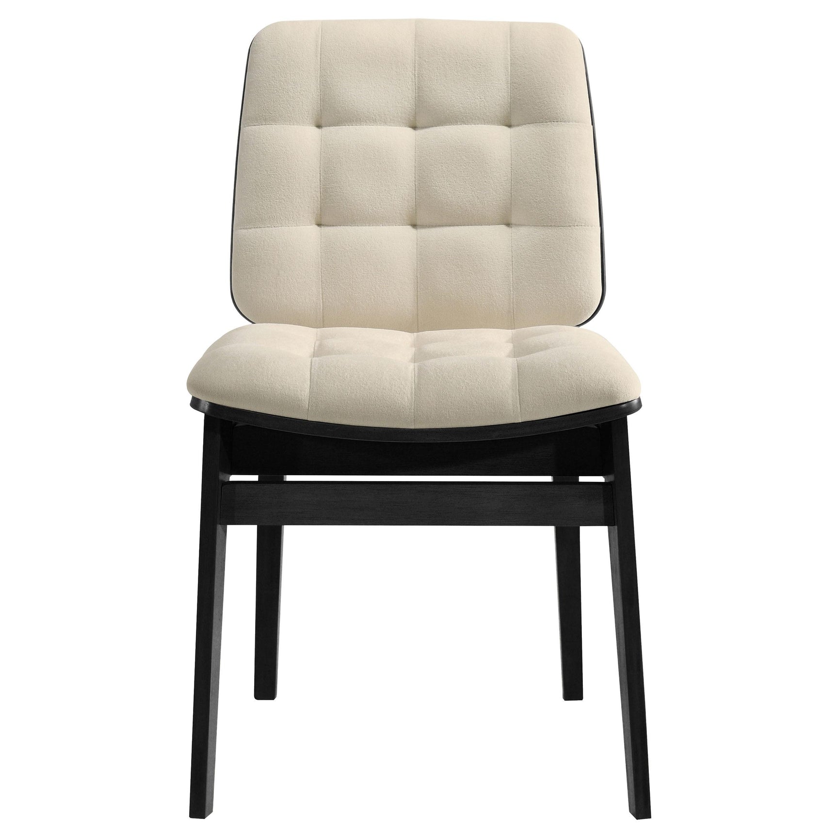 Side angle showing tapered black rubberwood legs and cream velvet seat