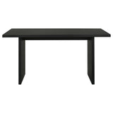 Close-up on table’s tall panel legs and square edges