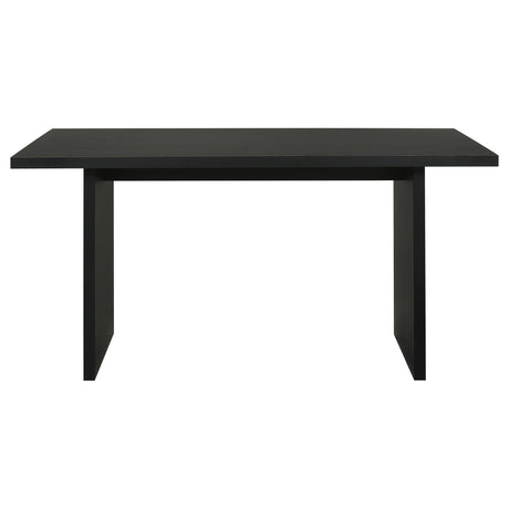 Close-up on table’s tall panel legs and square edges