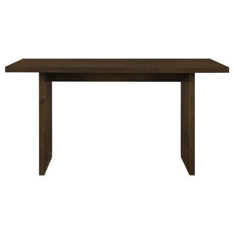 Side view of Decker 70-inch rectangular dark walnut counter height dining table