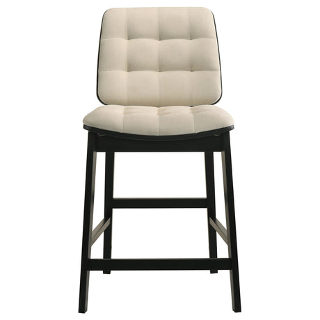 Redbridge counter chair side angle showing tufted back