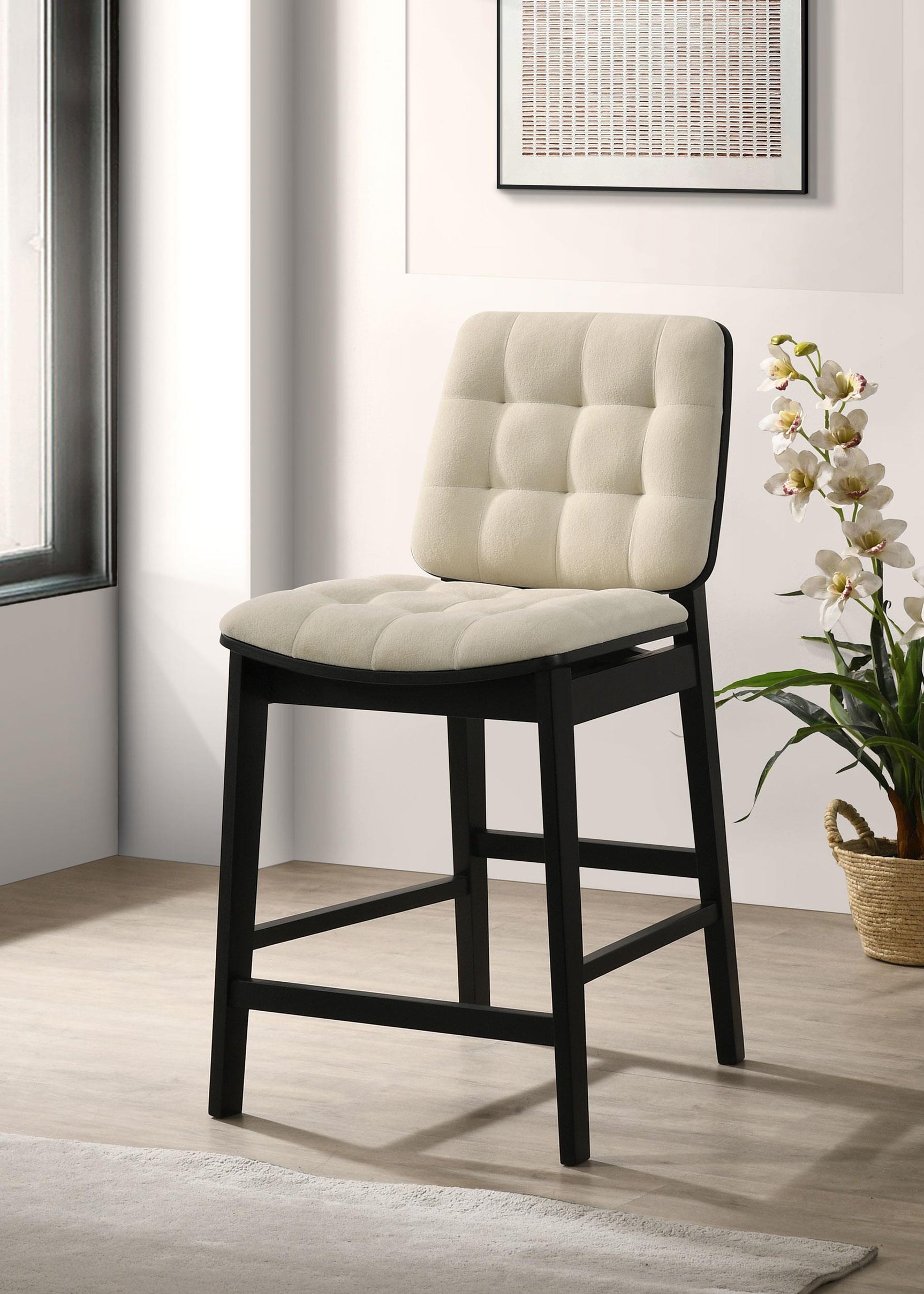 Close-up of channel tufted velvet seat in cream