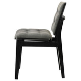 Tapered black wood legs of Redbridge side chair