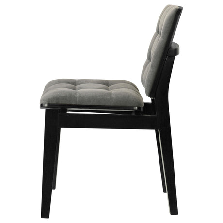 Tapered black wood legs of Redbridge side chair