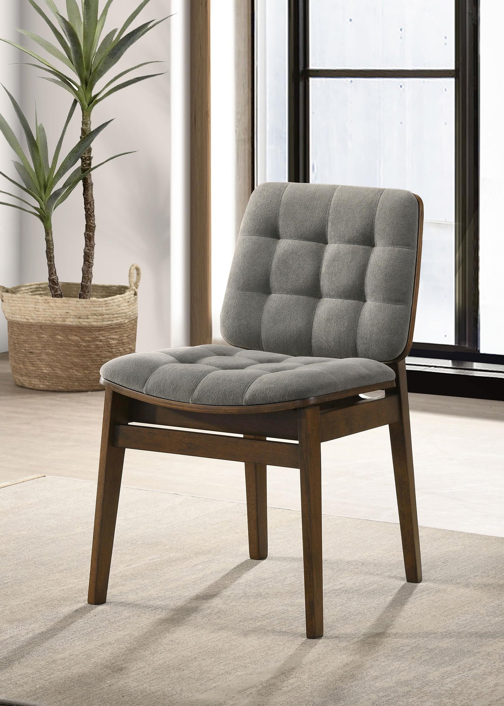 Side view of Redbridge dining side chair with grey velvet seat and walnut tapered legs