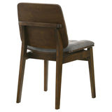 Angled back view of Redbridge dining chair showing velvet fabric and solid wood legs
