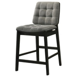 Detail of black rubberwood tapered legs on Redbridge counter chair