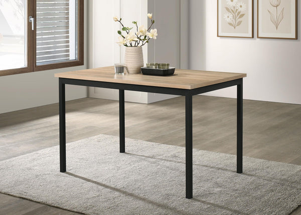 Garza dining table showing metal frame base