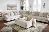 Side angle showing faux wood finish legs of Rawcliffe ottoman