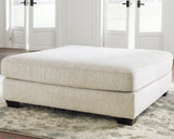 Rawcliffe ottoman shown in living room setting with light parquet floor