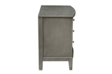 angled view of Cotterill gray tufted bedroom furniture