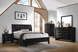 Briana Rectangle Black Dresser Mirror hanging over matching dresser