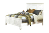 Sandy Beach White Nightstand with personal items on top