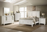 Side view of Sandy Beach king wood panel bed in cream white