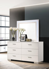 High gloss white finish detail on dresser mirror frame
