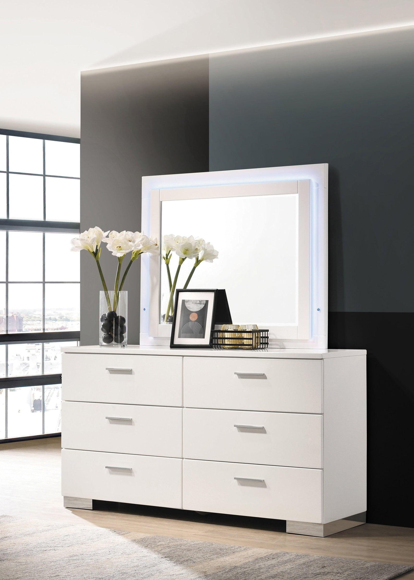 High gloss white finish detail on dresser mirror frame