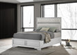 Full upholstered bed headboard with padded white fabric and horizontal stripe detail