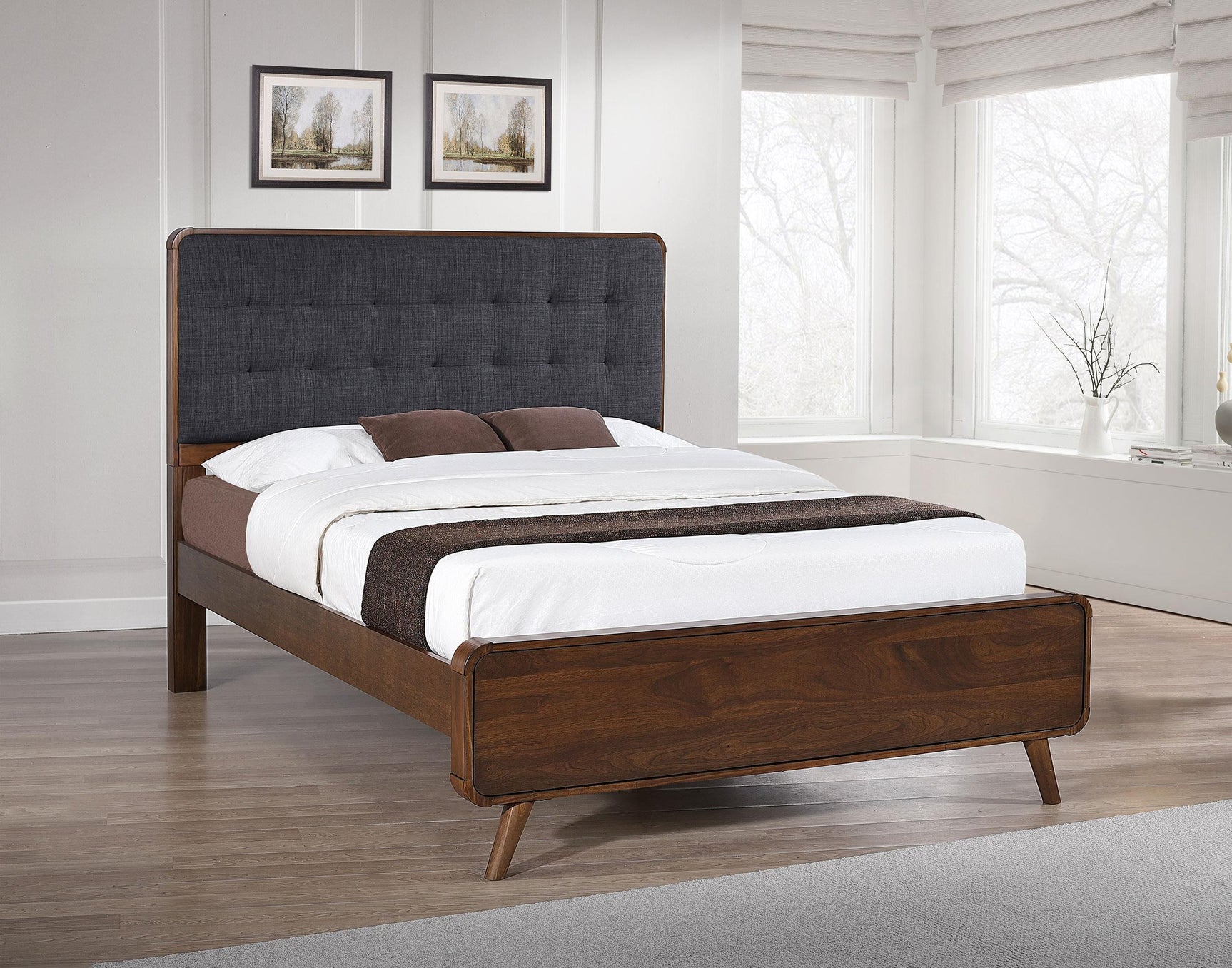 Close-up of tufted upholstered headboard on Robyn Wood Full Bed