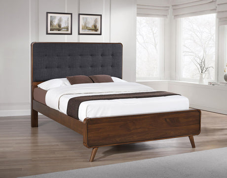 Close-up of tufted upholstered headboard on Robyn Wood Full Bed