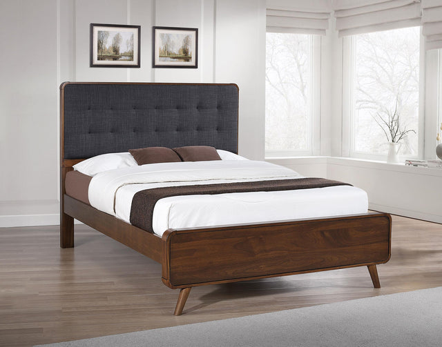 Close-up of tufted upholstered headboard on Robyn Wood Full Bed