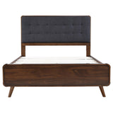 Footboard view of Robyn Wood Full Upholstered Bed in dark walnut