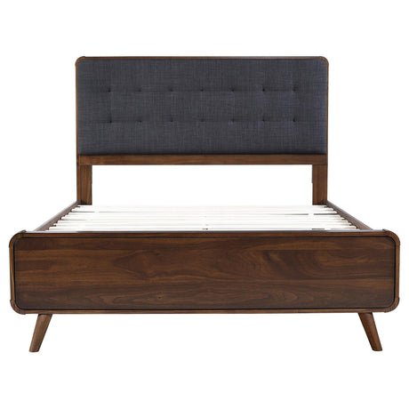 Footboard view of Robyn Wood Full Upholstered Bed in dark walnut
