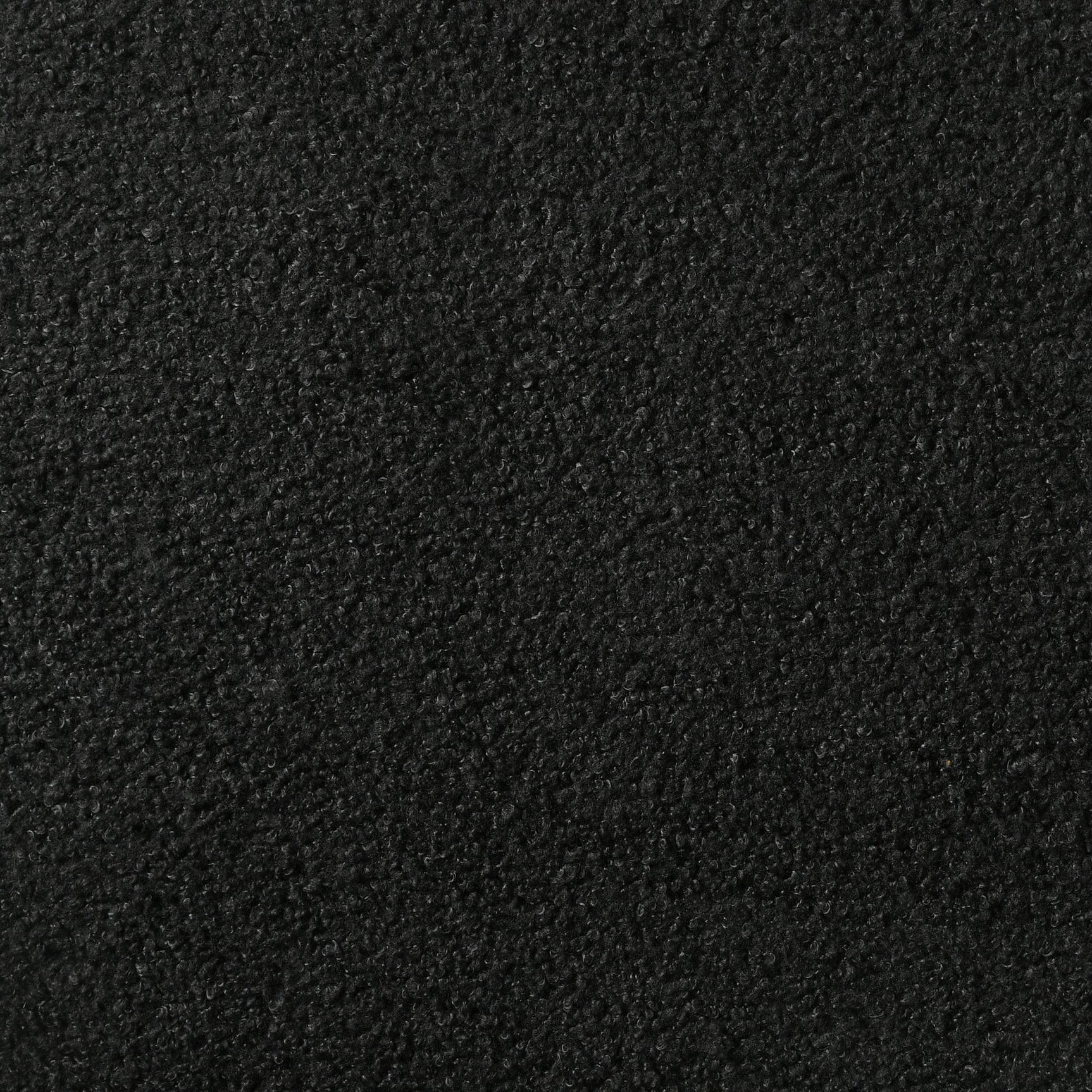 Miranda upholstered twin panel bed in black with sparkling trim, side angle view