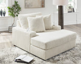 Living room scene featuring Lindyn Ivory Velvet Chaise