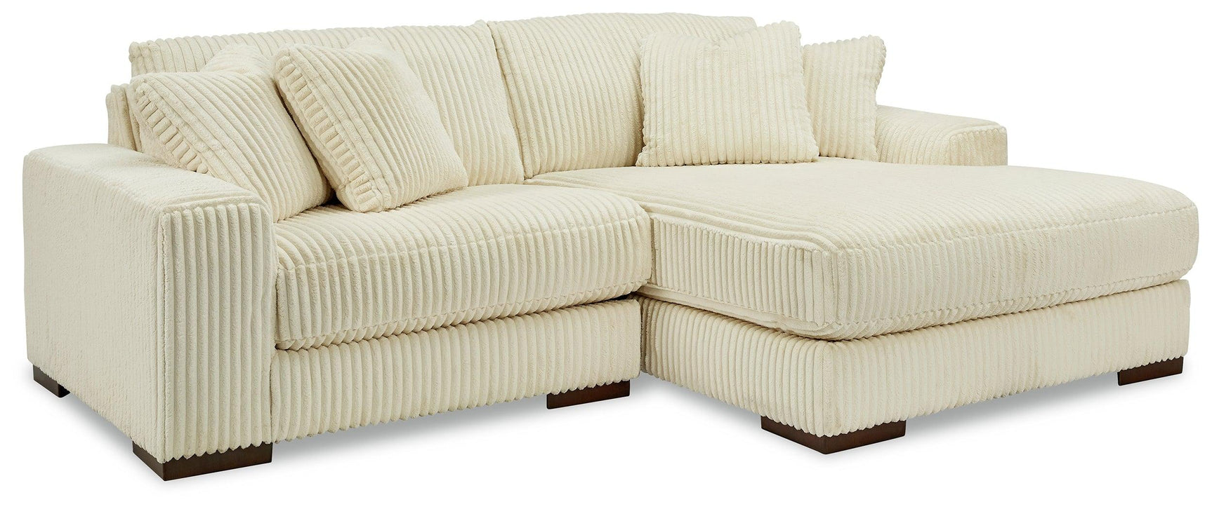 Side view of Lindyn Ivory 2-Piece Sectional Sofa with Chaise