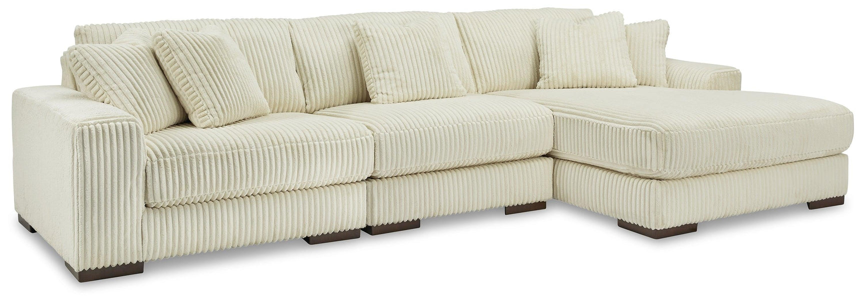 side view of Lindyn Ivory 3-Piece Sectional Sofa showing chaise