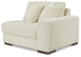 Room view with Lindyn Ivory sectional sofa