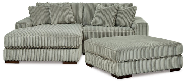 Side view of Lindyn Fog 2-Piece Sectional Sofa with Ottoman