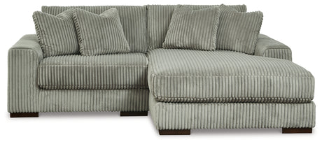 Side perspective of Lindyn Fog Sectional Sofa with Ottoman