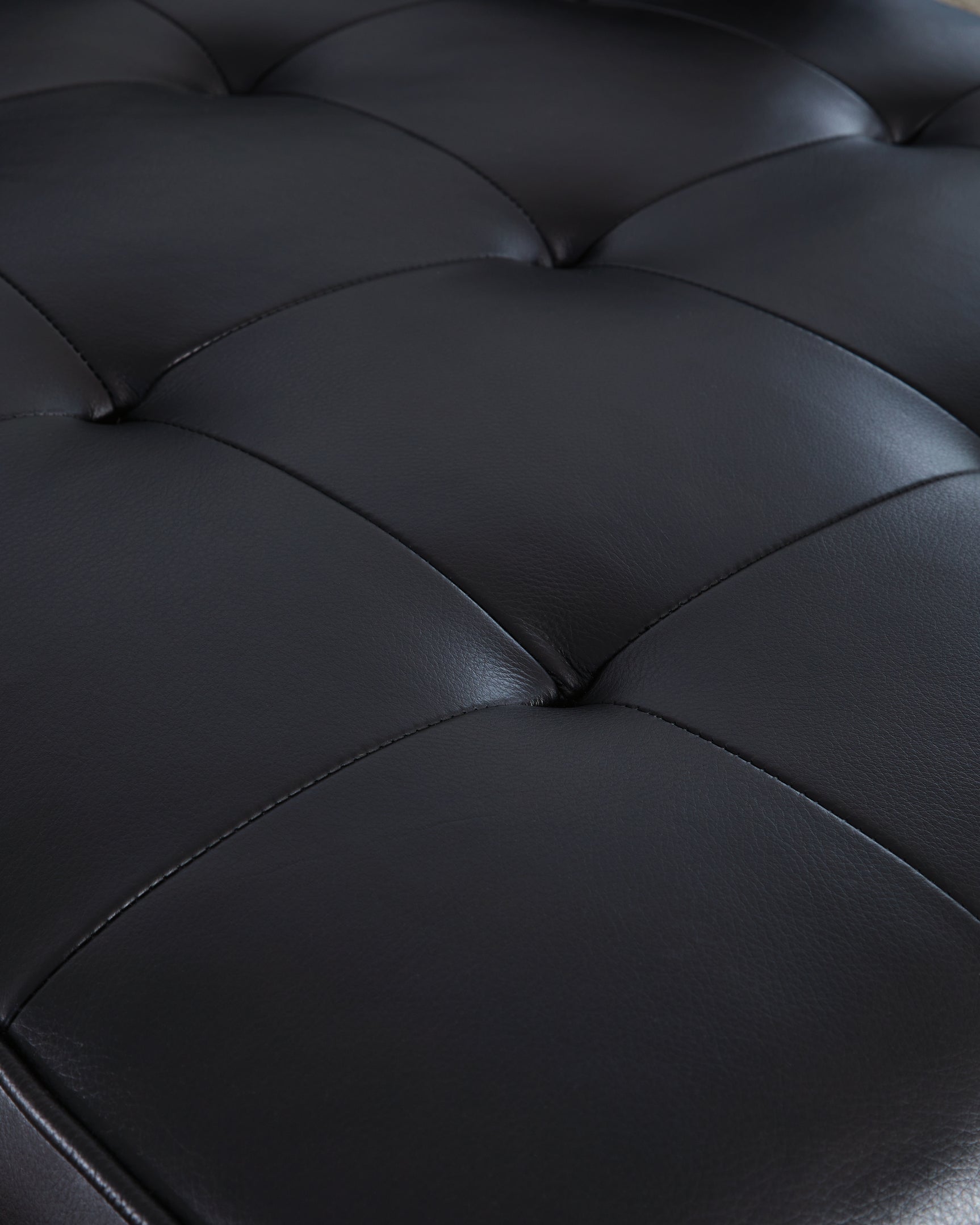 Bryceview Onyx Leather Sofa tufted detail close-up