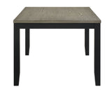 Room view of table surface and legs in Folio Gray Black Rectangular Dining Room Set