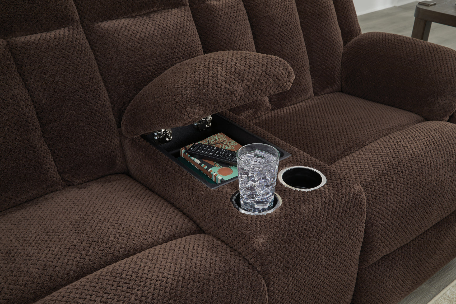Close-up of center console with cup holders and storage