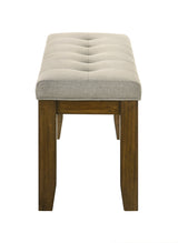 U-shaped leg detail of Hollister Light Brown dining table